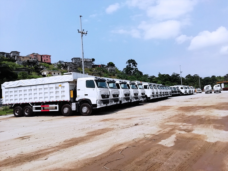 Delivery ceremony of Gabonese customer's 33 units of 8x4 tippers.